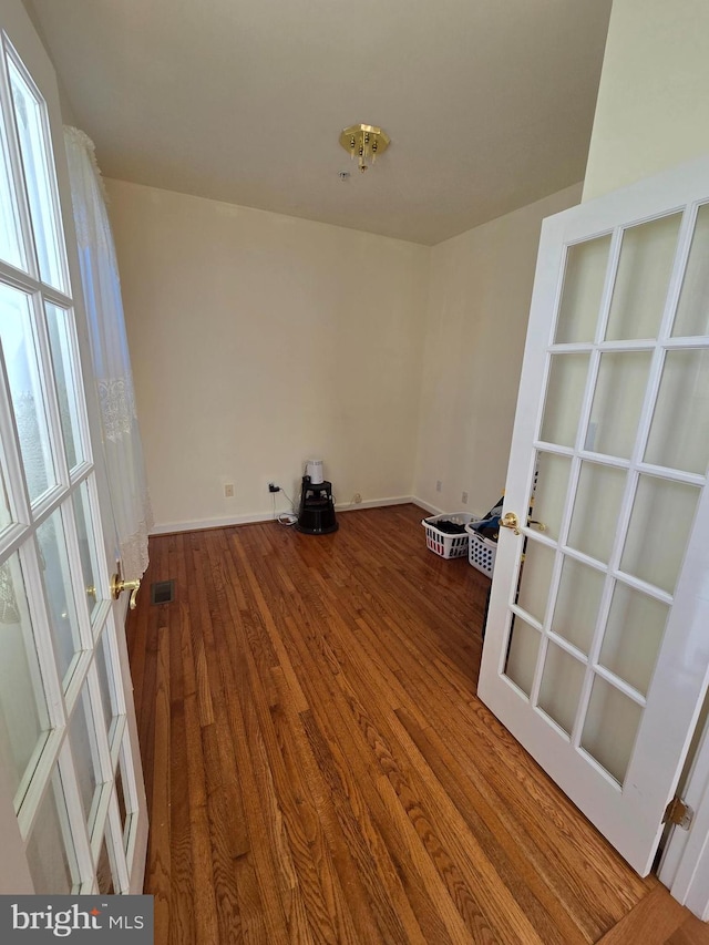 empty room featuring hardwood / wood-style floors