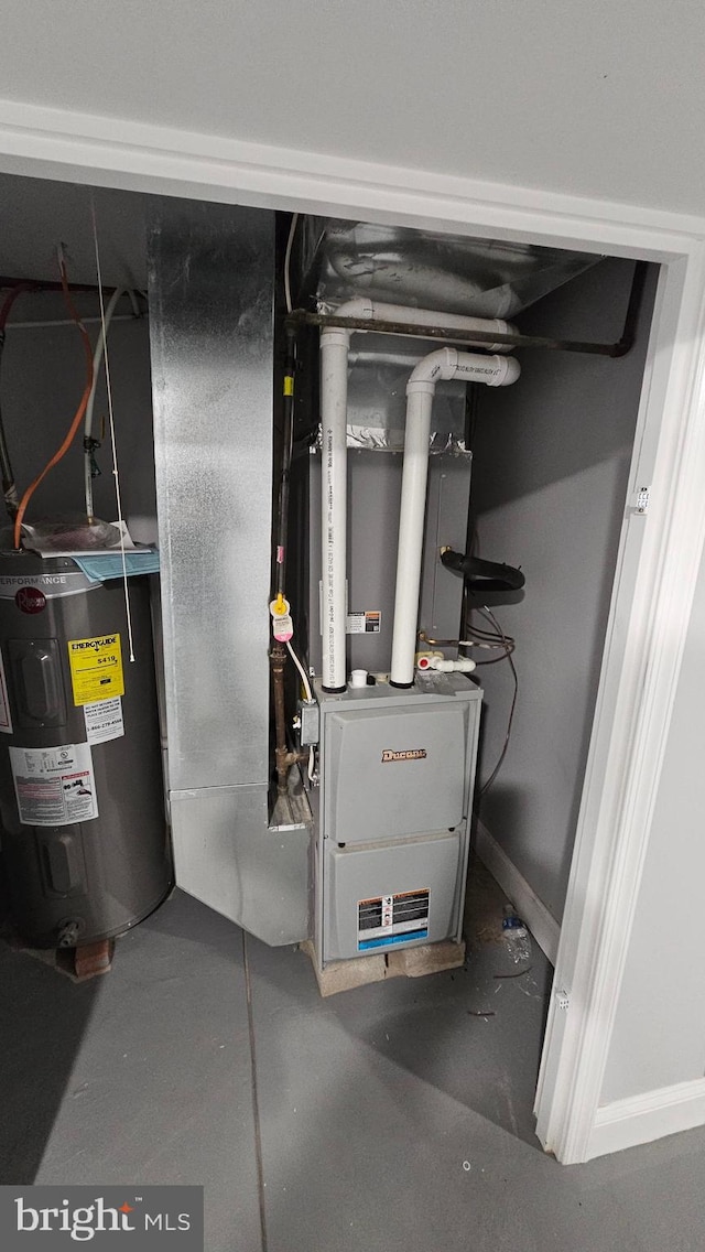 utility room with water heater