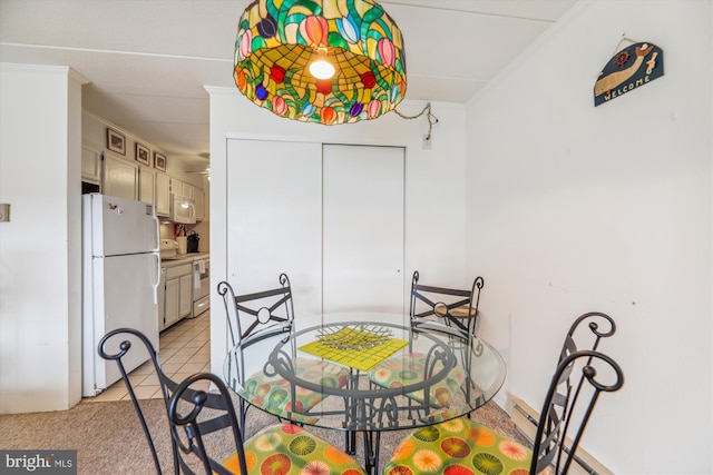 tiled dining space with crown molding