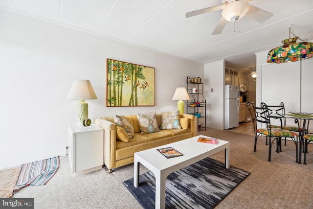 living room featuring light carpet