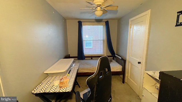 bedroom with ceiling fan and light carpet