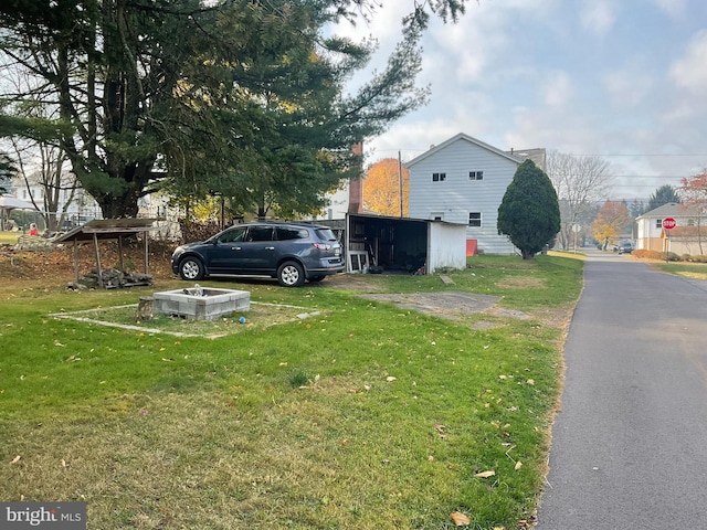 view of home's exterior with a lawn