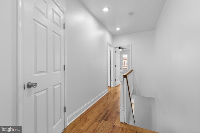 hallway with light wood-type flooring