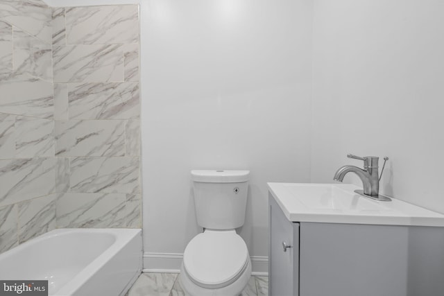 full bathroom featuring vanity, toilet, and tiled shower / bath