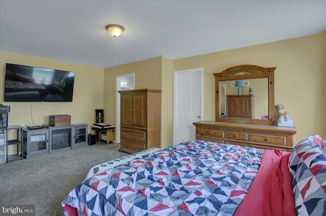 bedroom featuring carpet