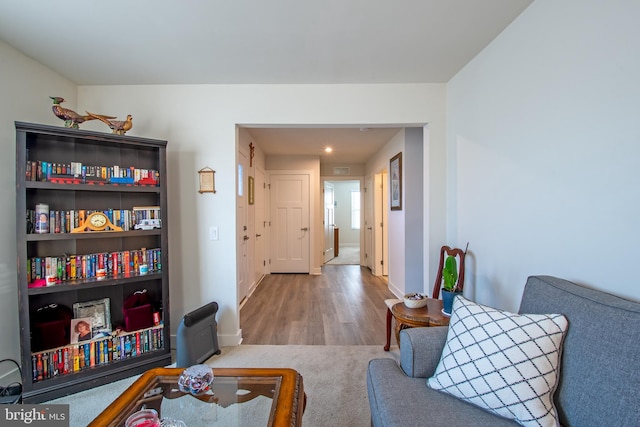 living area with wood-type flooring