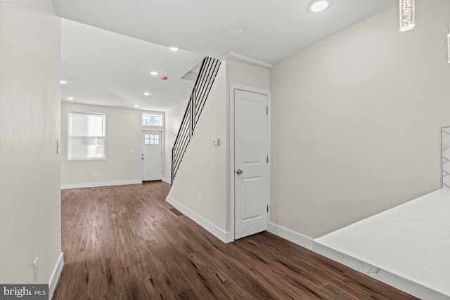 interior space with dark hardwood / wood-style flooring