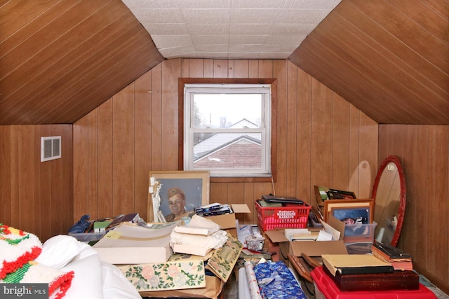 bonus room featuring wooden walls, vaulted ceiling, and wooden ceiling