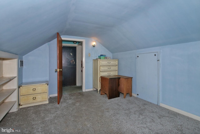 additional living space with lofted ceiling and carpet floors