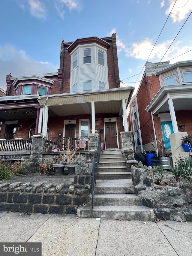 view of front of home featuring covered porch