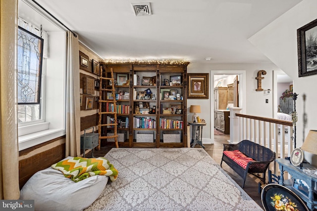 living area with wood-type flooring