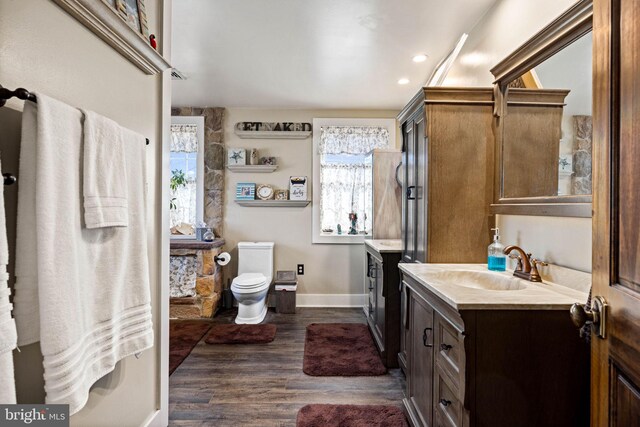 3204 State Route 72, Jonestown, PA 17038 - full bath with vanity, toilet, baseboards, and wood finished floors