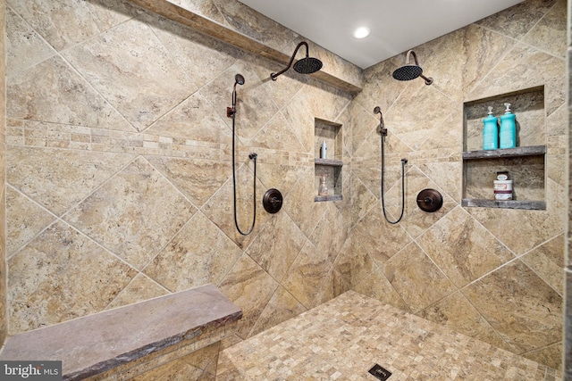 bathroom featuring tiled shower