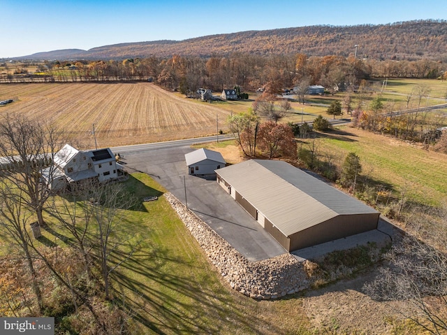 bird's eye view with a rural view and a mountain view