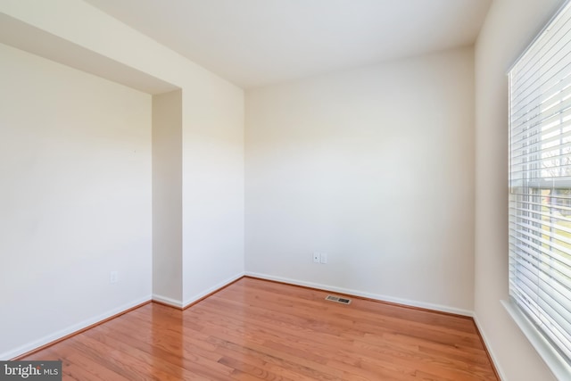 empty room with light wood-type flooring