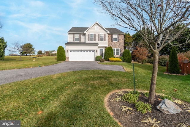 view of property with a garage and a front yard