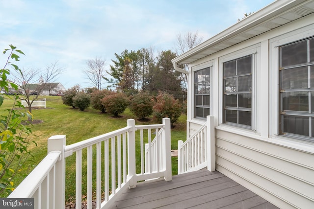 deck featuring a yard