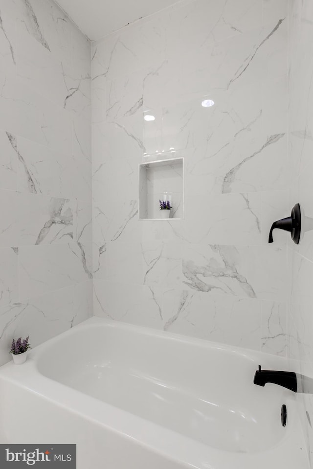 bathroom featuring a bathtub