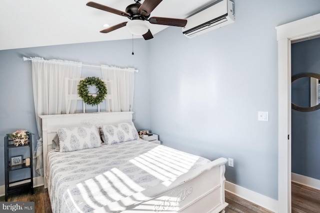 bedroom featuring vaulted ceiling, a wall mounted air conditioner, ceiling fan, and dark hardwood / wood-style floors