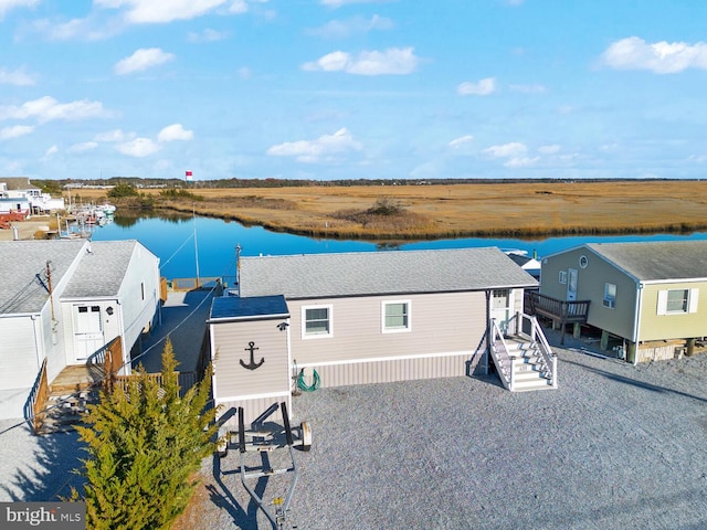 drone / aerial view with a water view