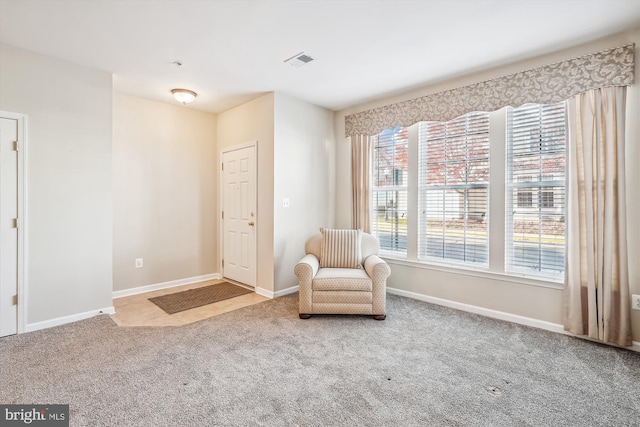 unfurnished room featuring carpet floors