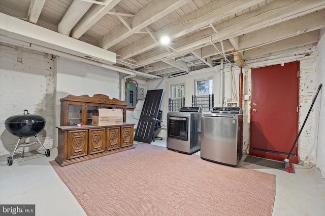 415 E Lafayette Ave, Baltimore, MD 21202 - basement featuring washing machine and clothes dryer and electric panel