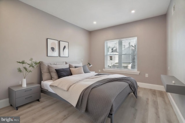 bedroom featuring light hardwood / wood-style flooring