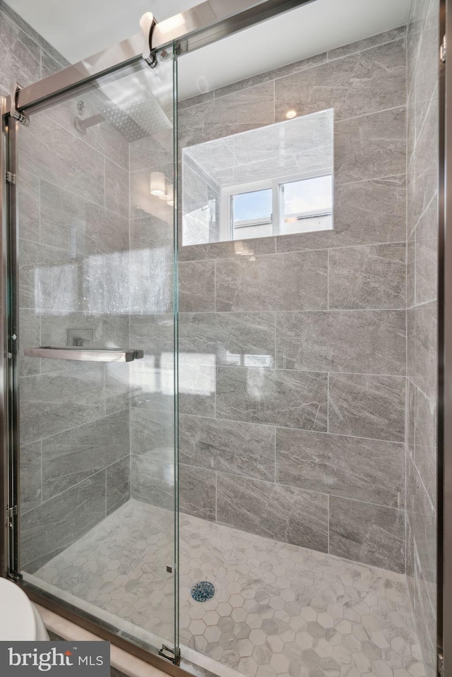 bathroom with walk in shower