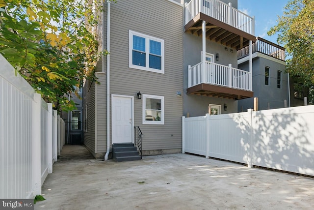 rear view of house featuring a patio