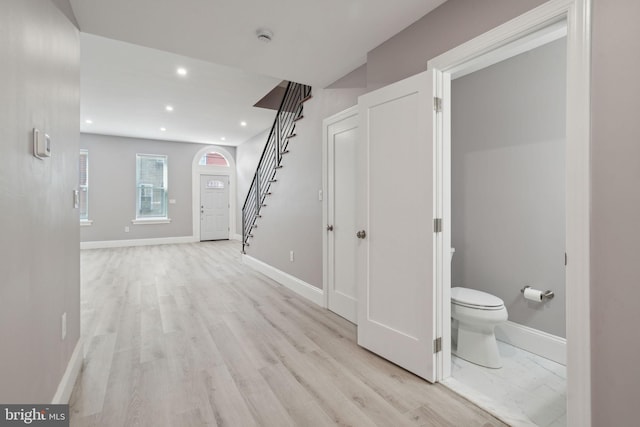 hallway featuring light wood-type flooring