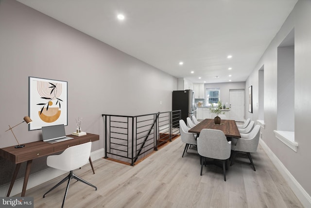 dining room featuring light hardwood / wood-style floors