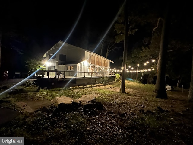 view of yard at twilight