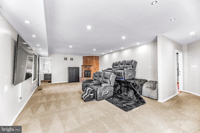 interior space featuring light carpet and a brick fireplace