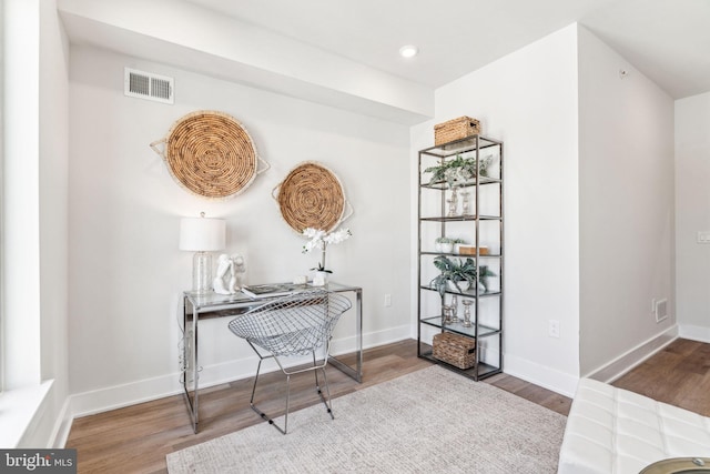 office space featuring hardwood / wood-style flooring