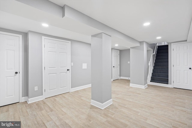 basement featuring light hardwood / wood-style floors