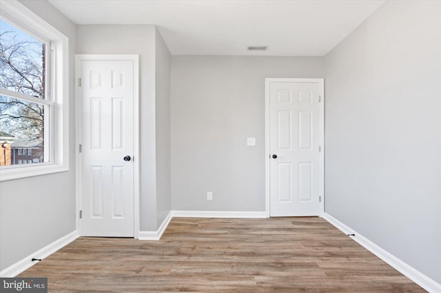 unfurnished bedroom featuring light hardwood / wood-style flooring