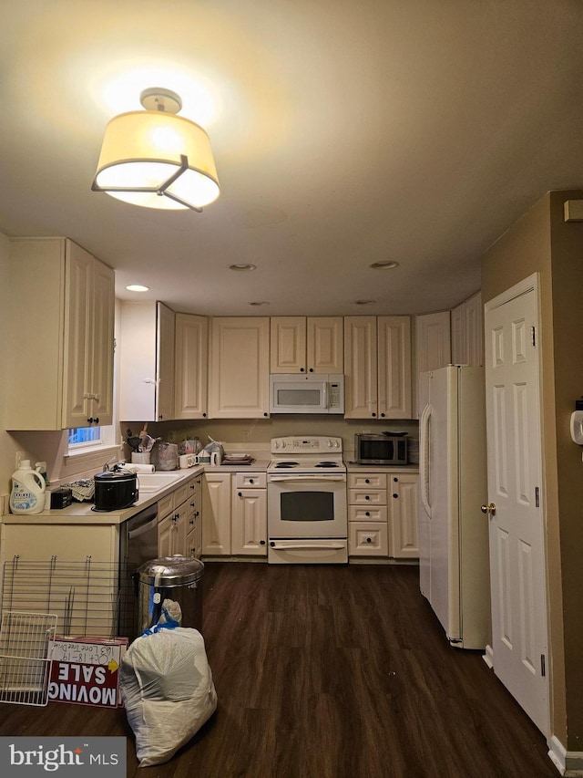 kitchen featuring dark hardwood / wood-style floors and stainless steel appliances