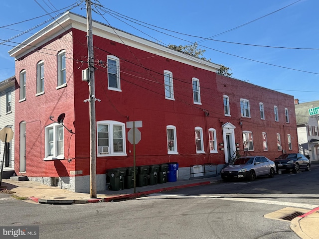 view of building exterior featuring cooling unit