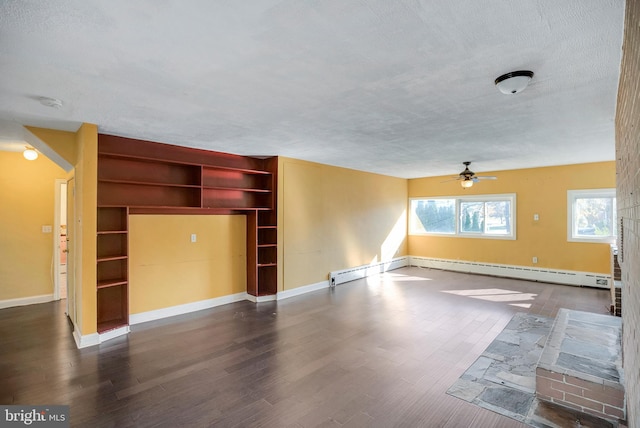 unfurnished living room featuring a textured ceiling, ceiling fan, and dark hardwood / wood-style floors