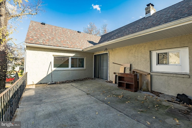 rear view of property with a patio area