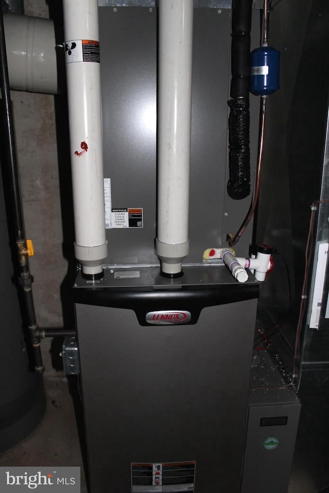 utility room with heating unit