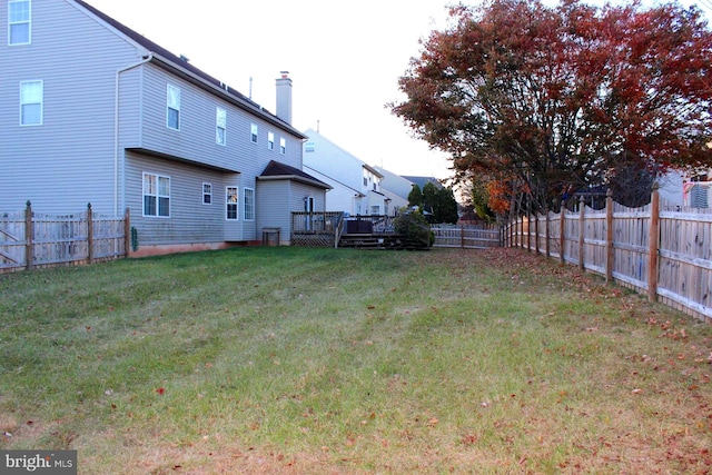 view of yard with a wooden deck