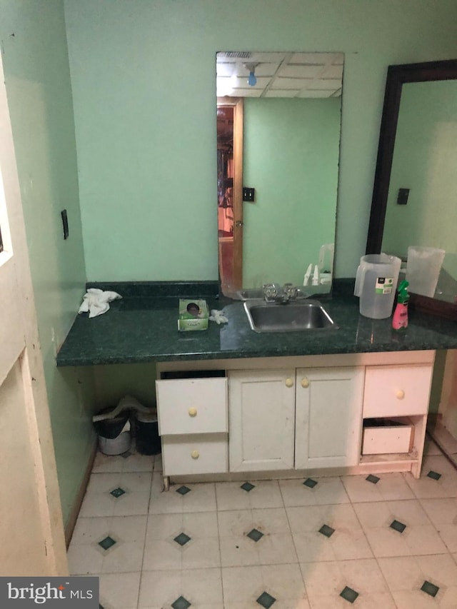 bathroom with sink and tile patterned floors