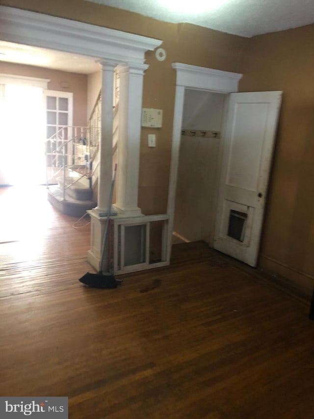 interior space with dark wood-type flooring