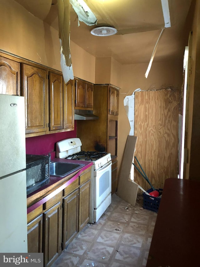 kitchen featuring white appliances