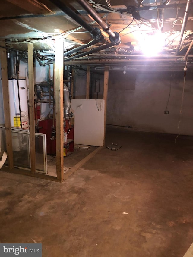 basement featuring gas water heater