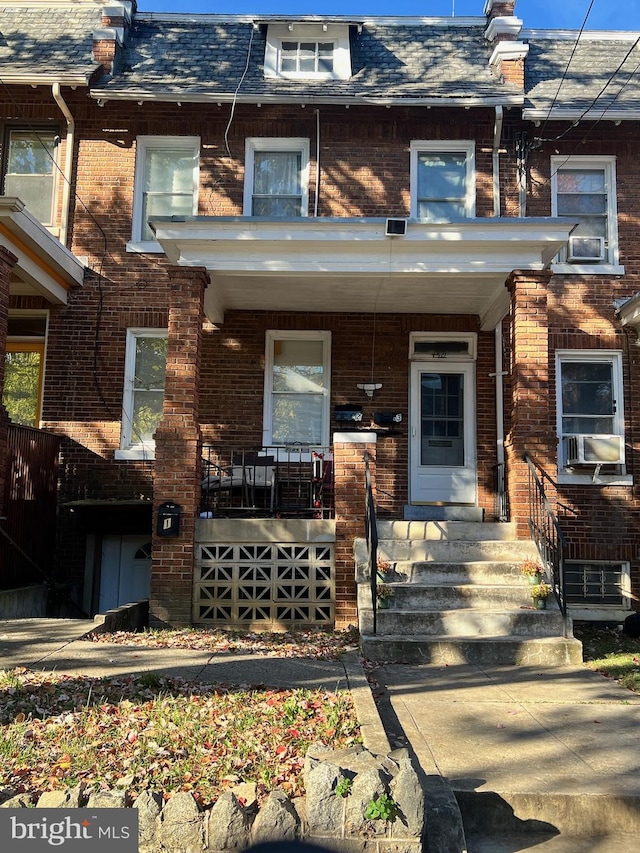 view of property with covered porch