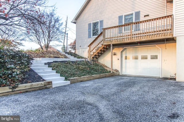 view of property exterior featuring a garage