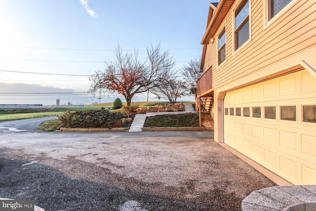 view of yard featuring a garage