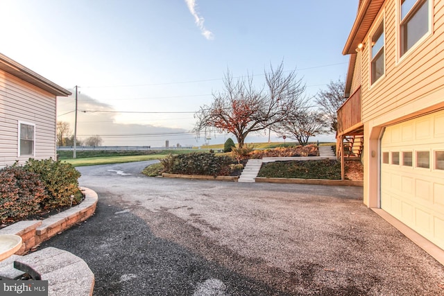 view of yard featuring a garage